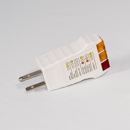 Tala grounding sheet volt tester on white background showing a significant voltage drop when grounded, proving the earthing effect in action.